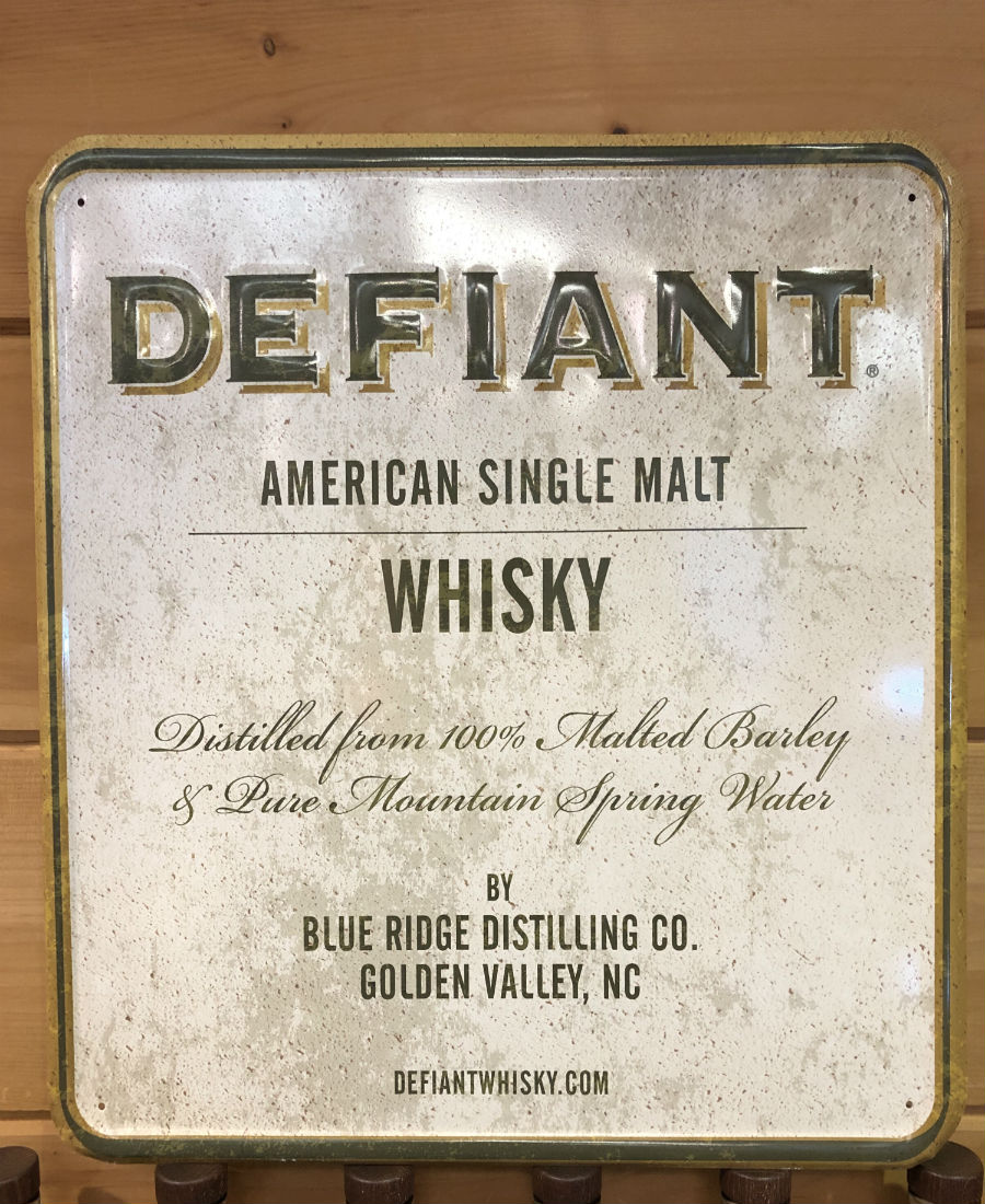 Defiant Tin Wall Sign
